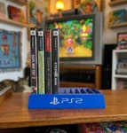 Blue Playstation Holder Holds 10 Games Sony Game Storage Display Ps2 Desktop Dvd. Fixed Price $70.00.