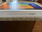 Portable Monitor W156f1 15.6 Inches Open Box, Never Used!!. Fixed Price $43.40.
